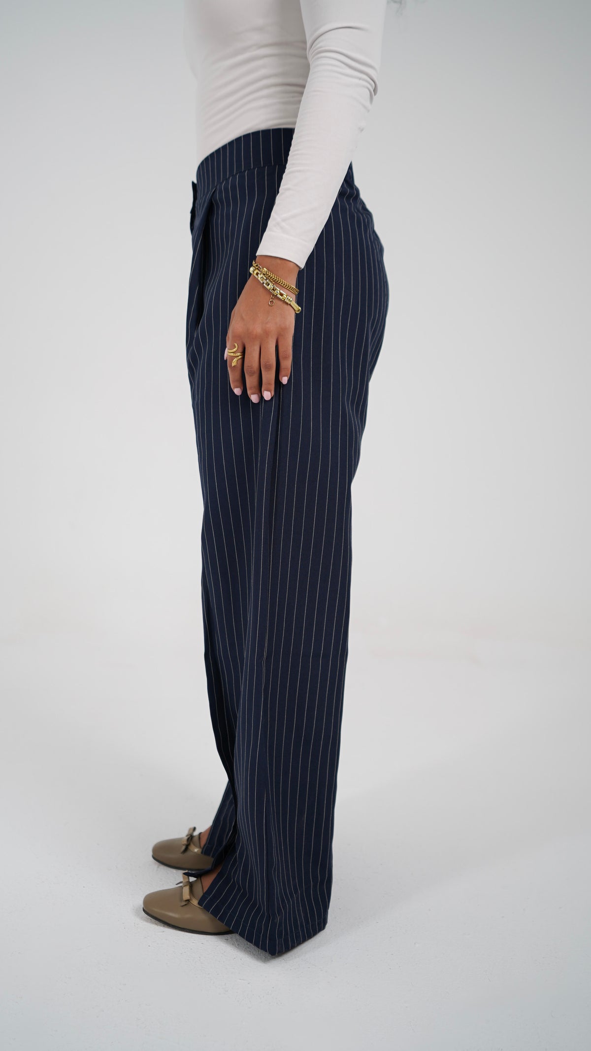 The Navy Pinstripe Pants, side view