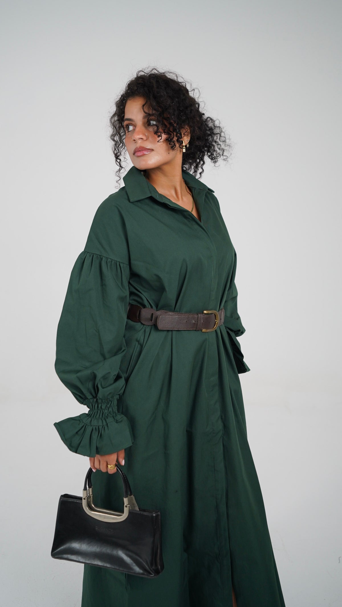 The Olive Dress, three-quarter view showing the gathered sleeve