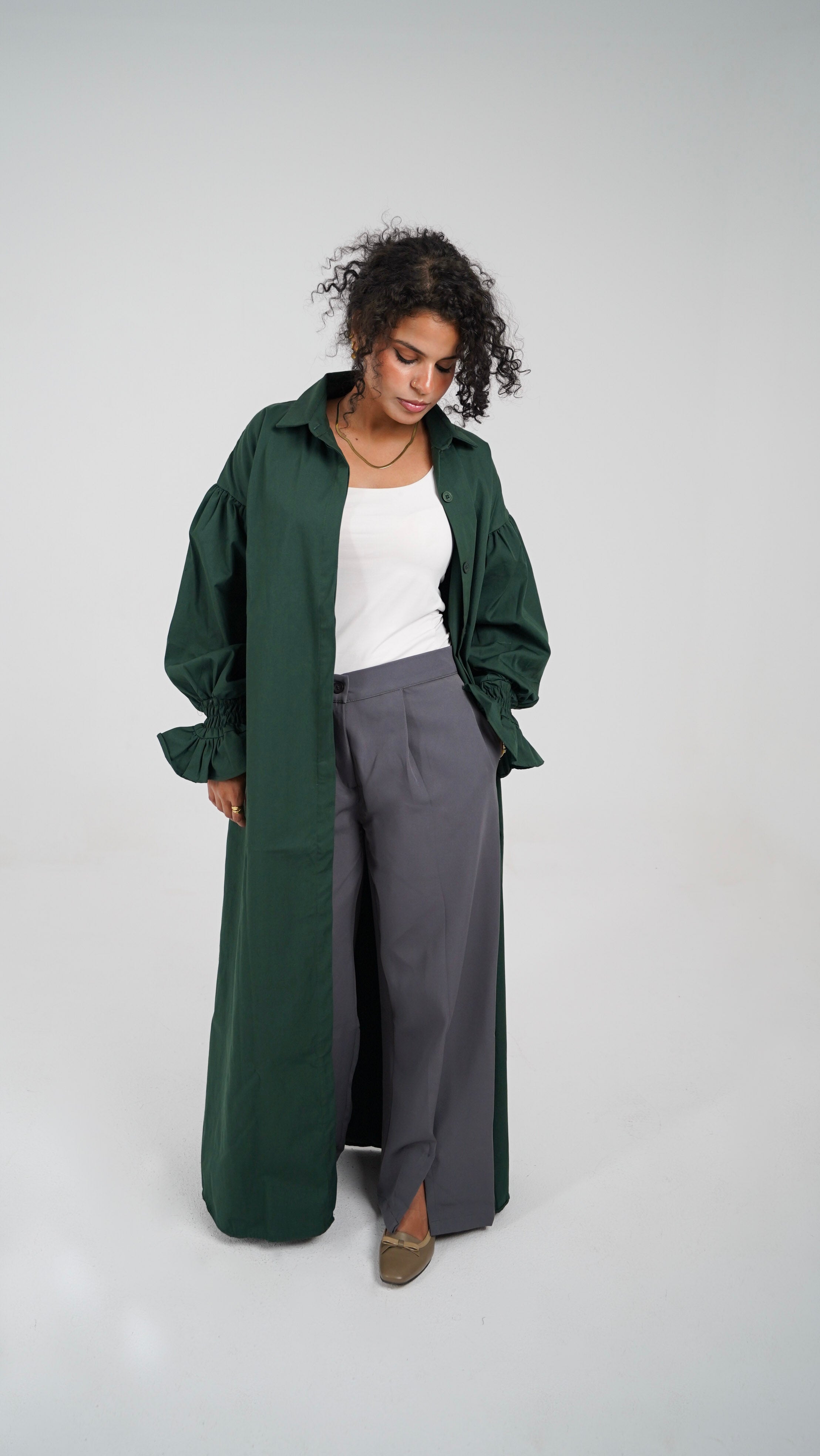 The Olive Dress worn open over The Everyday Pants in grey